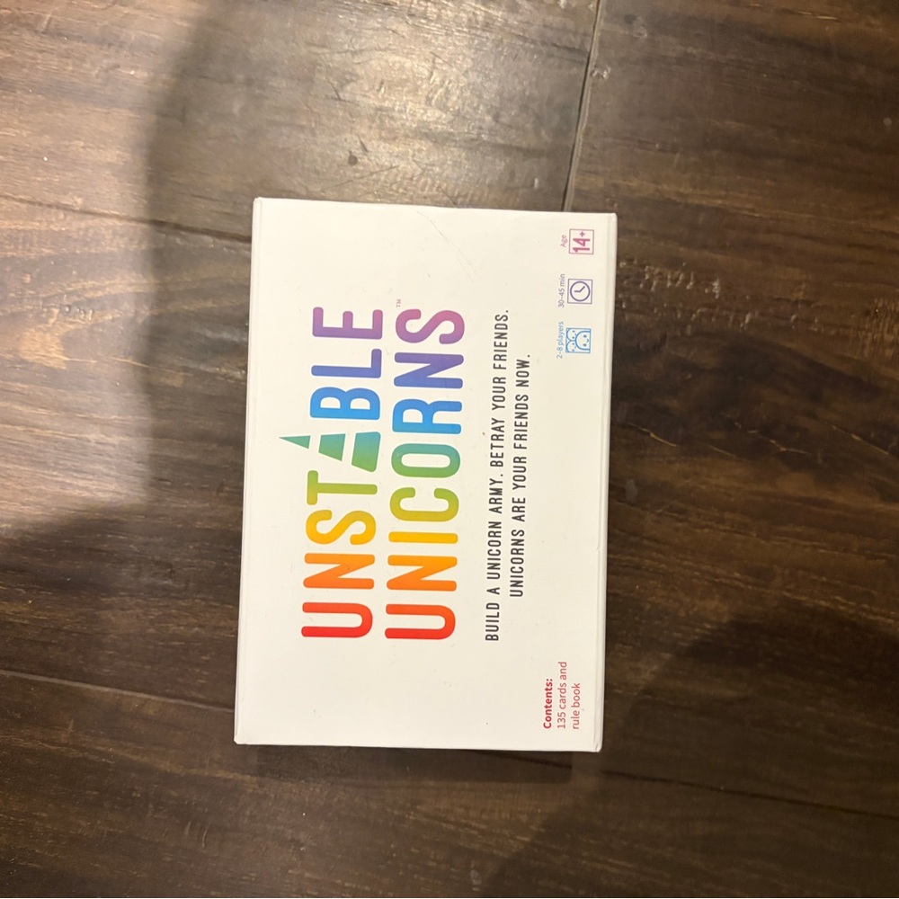Unstable Unicorns Card Game - White Box with Rainbow Logo
